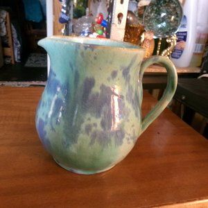 vintage signed drip glazed pottery pitcher.